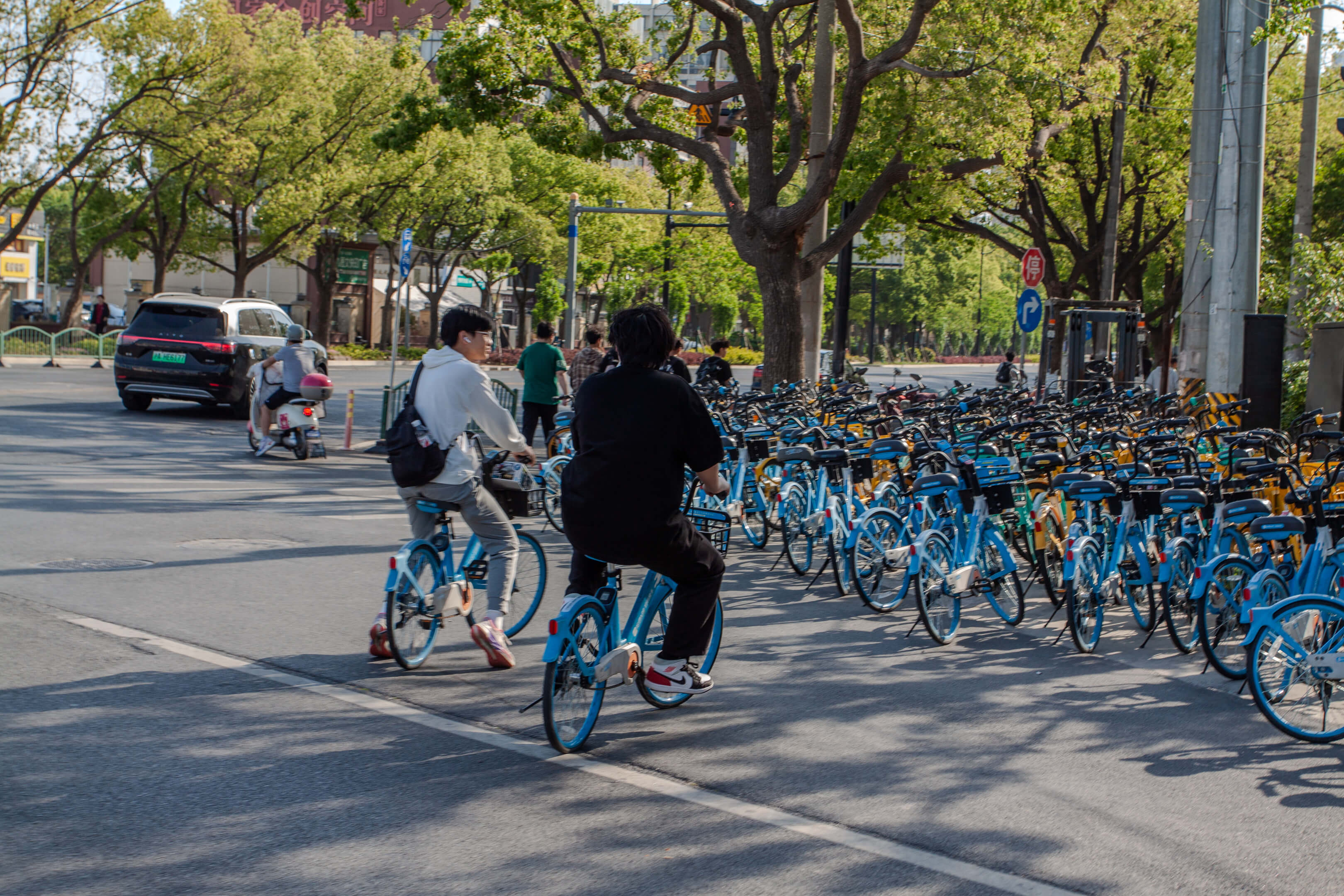 Yuxi, Eric and bicycles