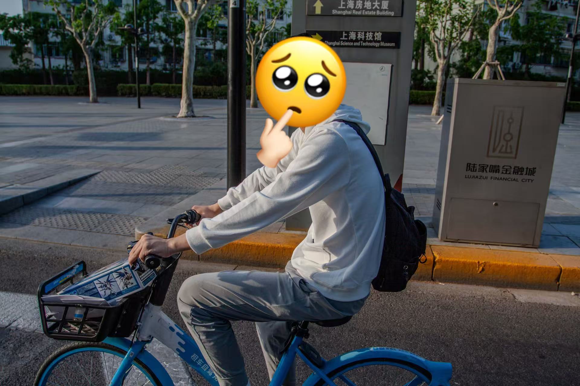 Yuxi riding a bicycle